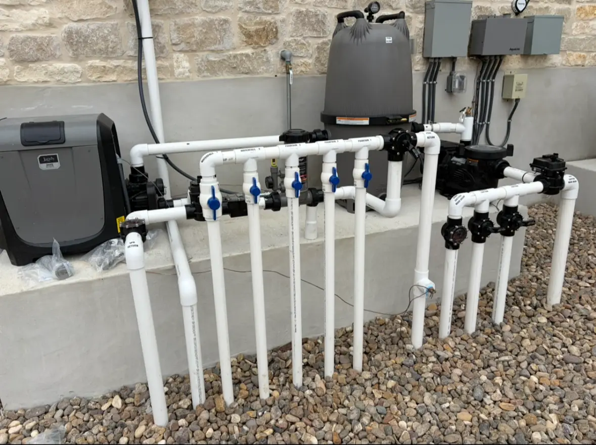 Pool equipment pad with pump, filter and valves serviced by Villa Pools Texas in Bulverde, TX